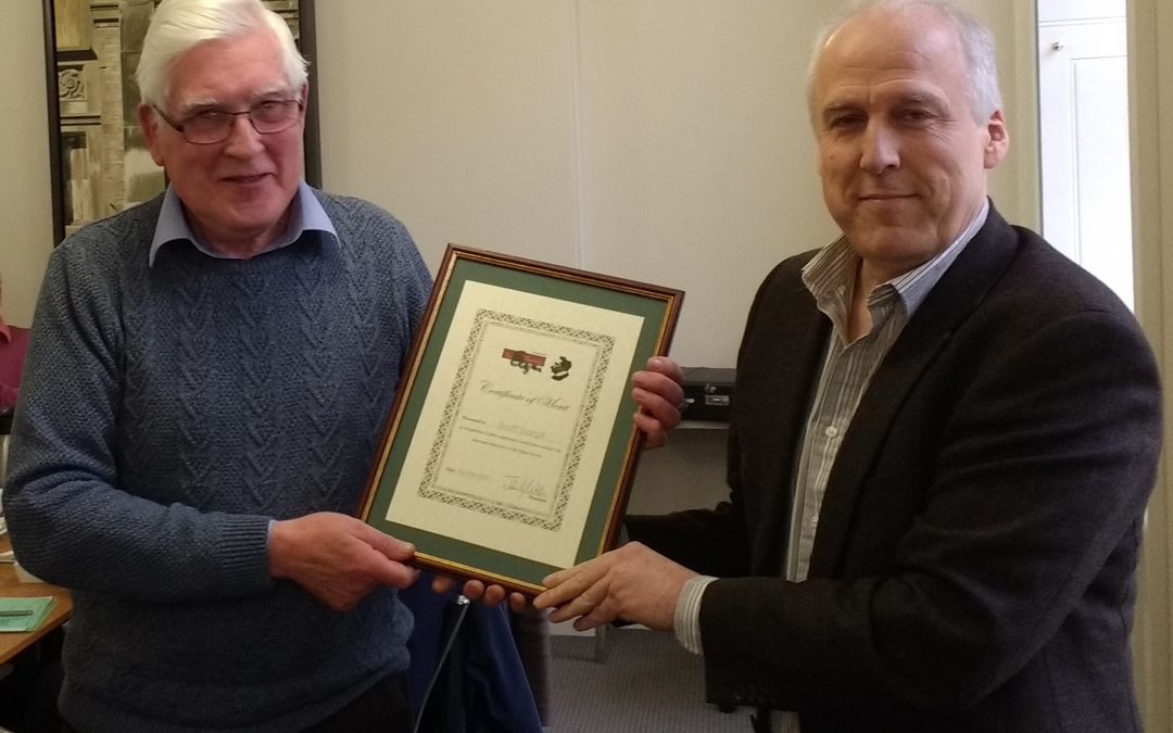 Geoff Scargill receives the Certificate of Merit