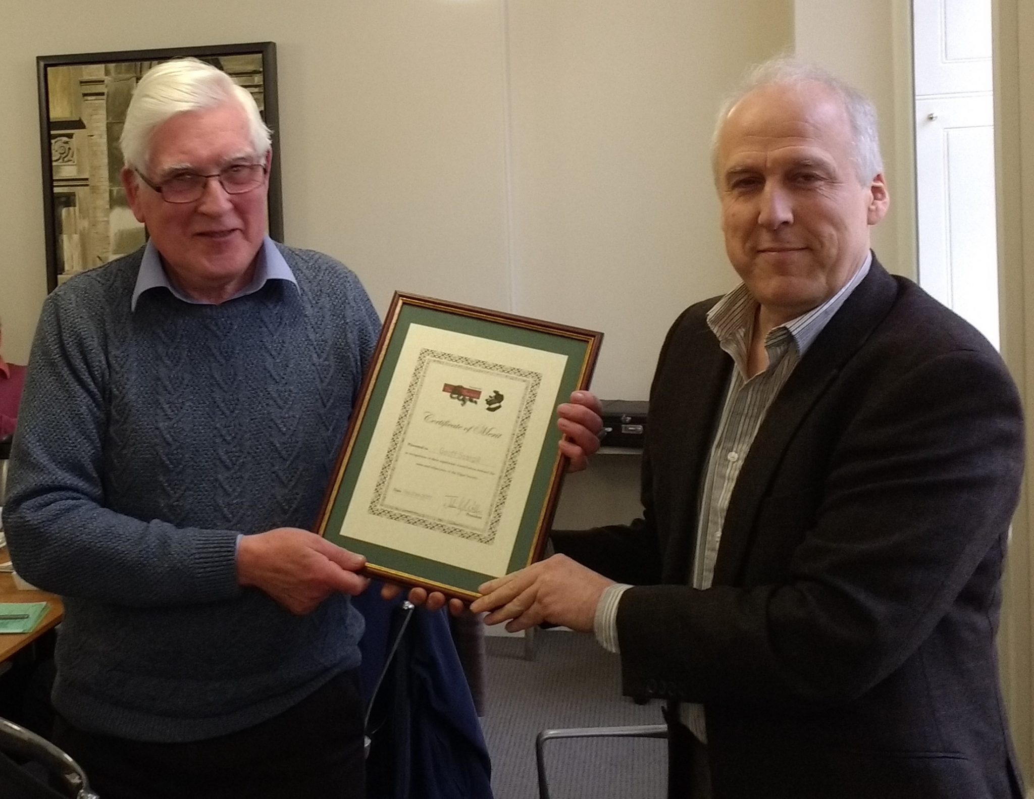 Geoff Scargill receives the Certificate of Merit